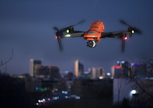 An Autel Evo II 6k Pro drone hovers in front of the city of Richmond